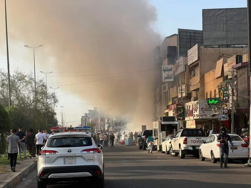 اندلاع حريق داخل بناية تجارية في حي الجامعة غربي بغداد